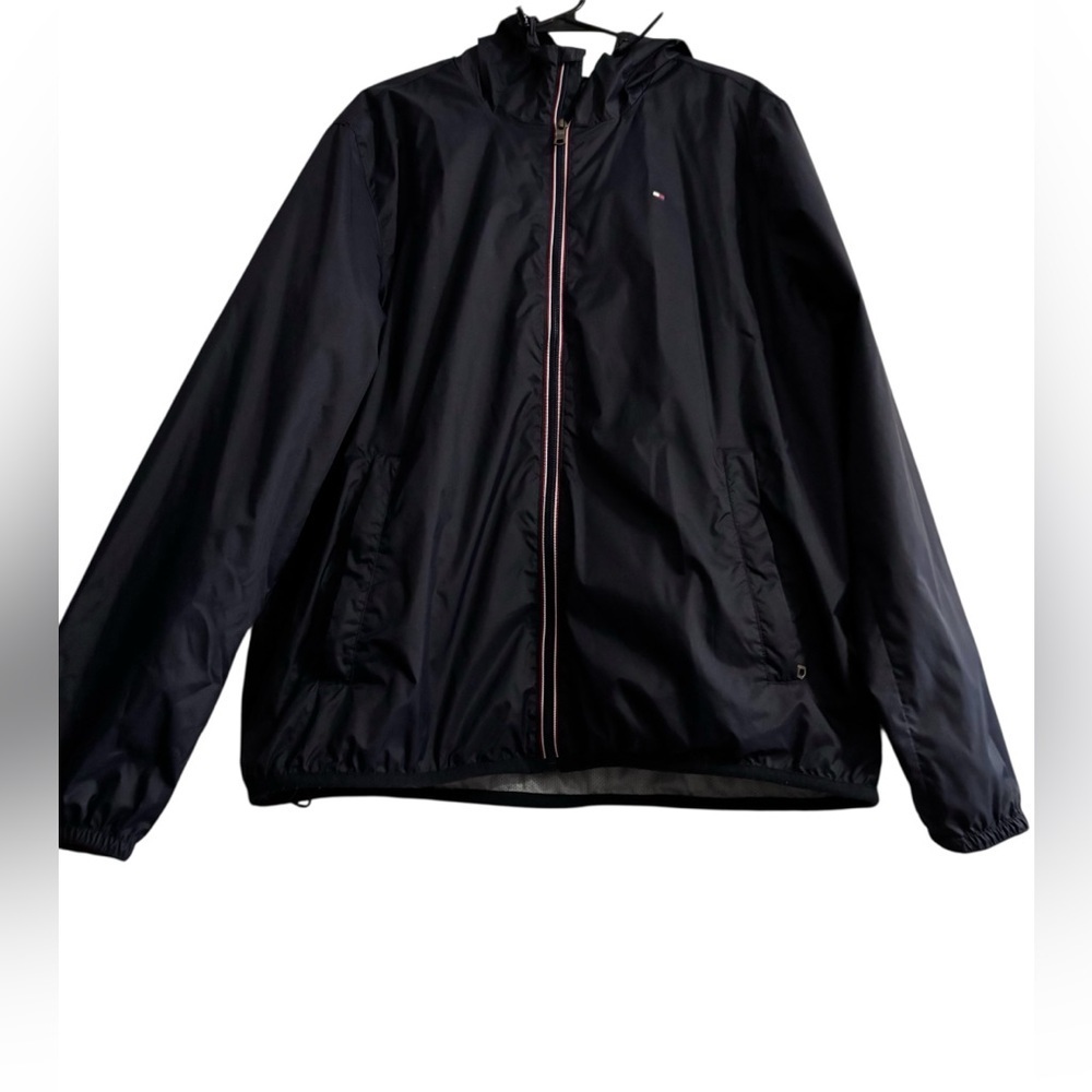 Tommy Hilfiger Navy Jacket with Red and White Accents/ in a good used condition.
